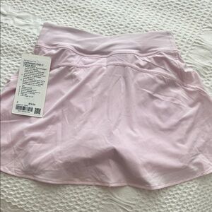 Lululemon light Pink Women's Skirt with shorts under